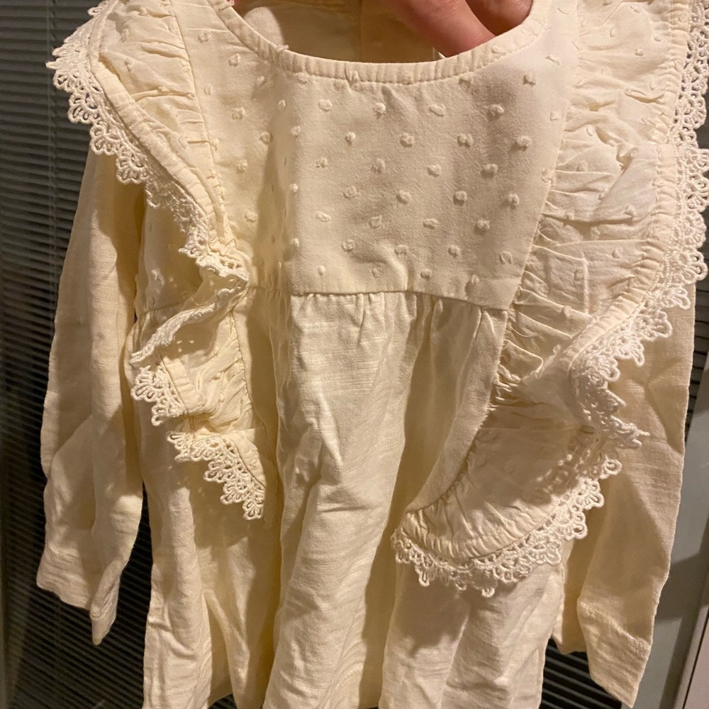 Hanna Andersson Organic Cotton Cream Ruffled Baby Top
